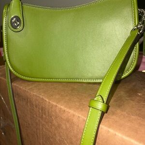 Coach Swinger in Dark Lime